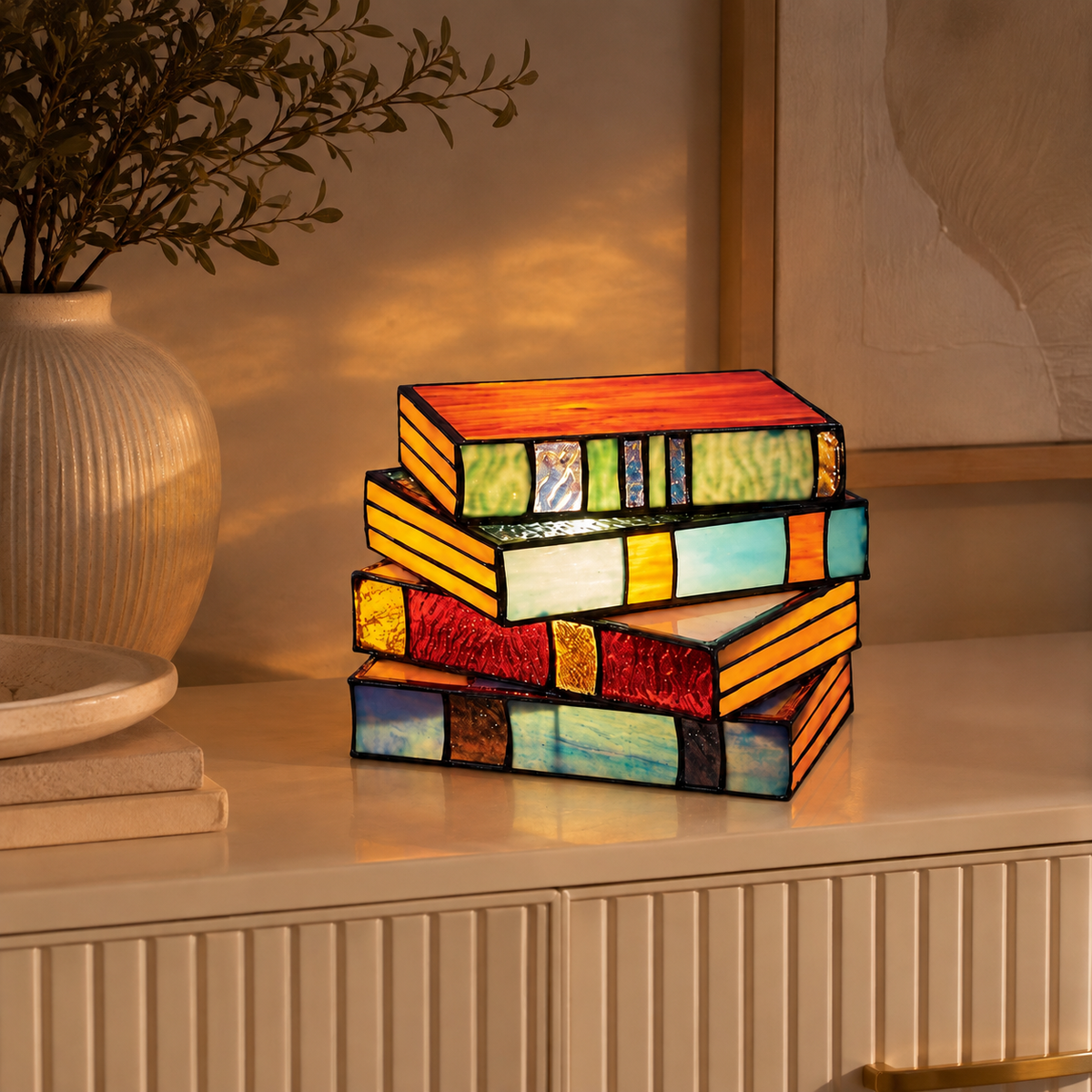 Book LED Table Lamp glowing on an elegant sideboard