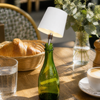 White plastic tip bottle lamp on a cafe table