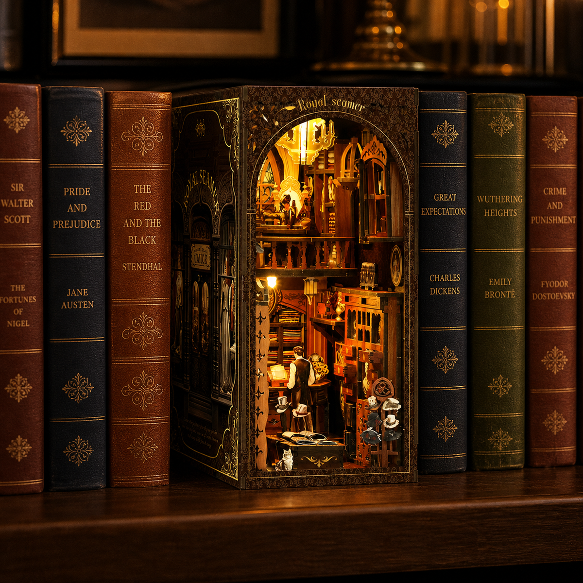 Vintage tailor shop book nook on a library shelf