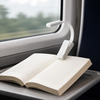 White clip-on reading light for train travel