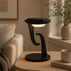 Black wireless charging suspension lamp in a living room