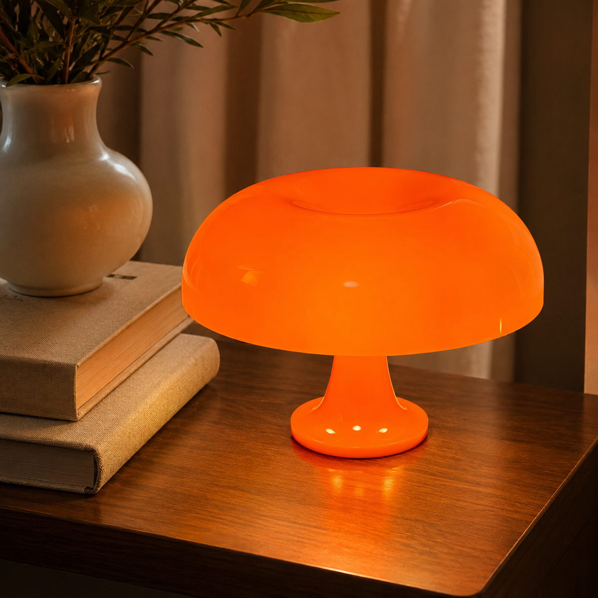 Orange Danish Mushroom Night Light styled with books and a vase