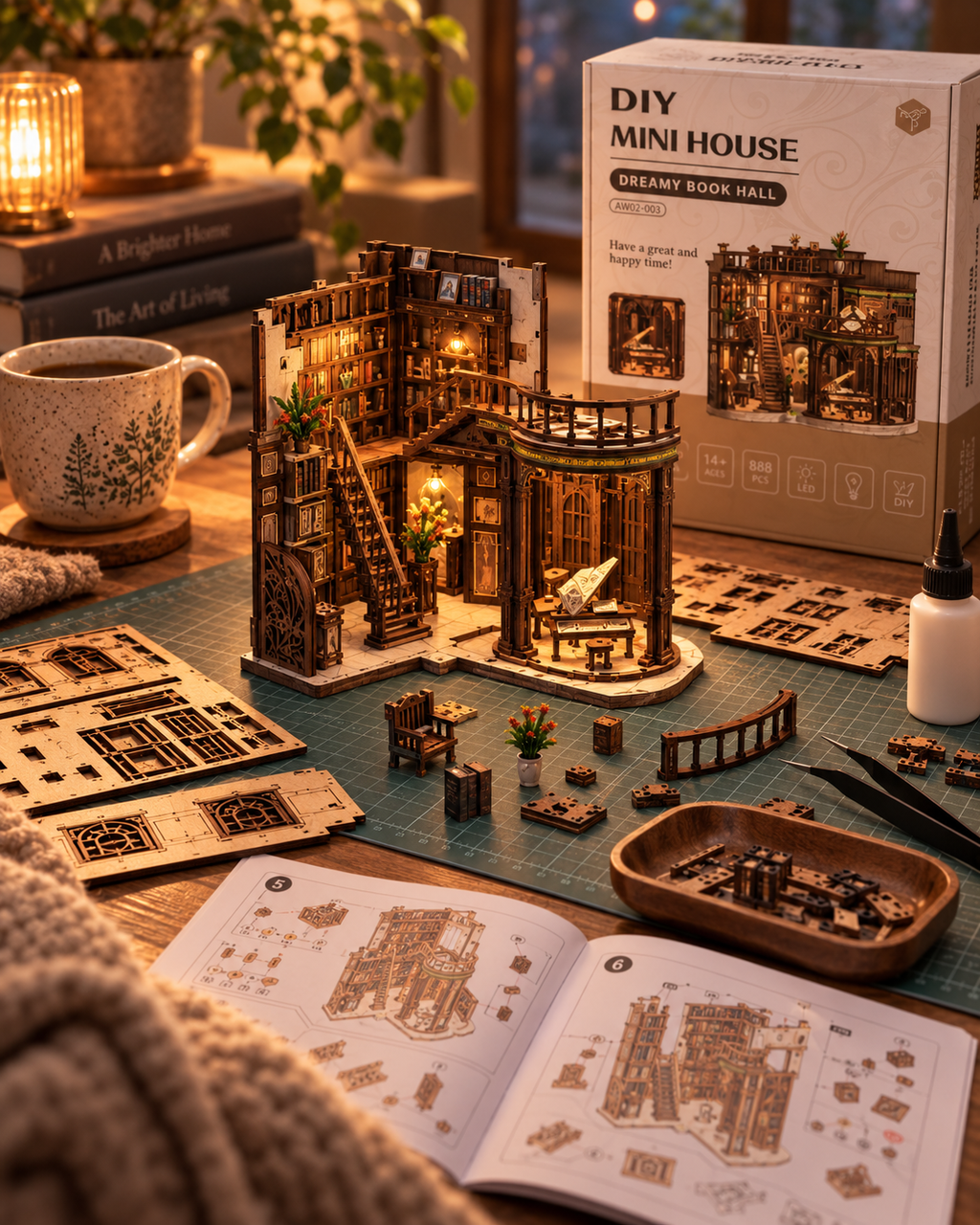 Dreamy Book Hall partially assembled on a warm craft workspace with instructions and pieces